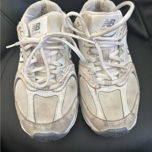 New Balance Kids Cream and Gray Sneakers